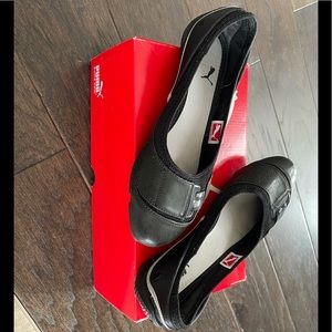 Puma flats.
